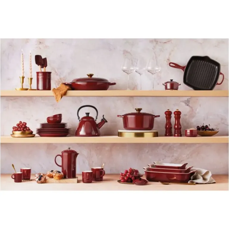 Cocotte en Fonte Ovale 31 cm Garnet Bouton Doré Le Creuset Signature