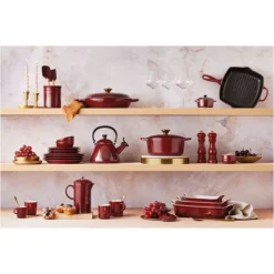 Cocotte en Fonte Ovale 29 cm Garnet Bouton Doré Le Creuset Signature